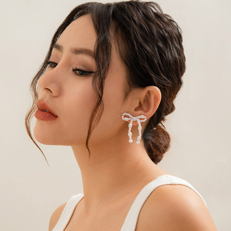 Wholesale Bow French Tassel Earrings Simple Light Luxury Imitation Pearl Earrings